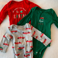 Christmas onesies and a pair of leggings. Carter’s 3 to 6 months