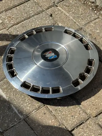 Buick hubcap 20 slot 14" GM #25522241 Factory original Buick hubcap, good used condition. (4) Set