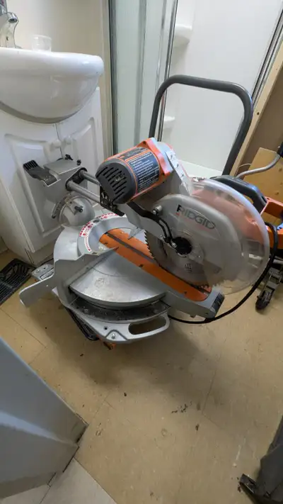 12" dual-bevel sliding mitre saw with mobile work stand, View more