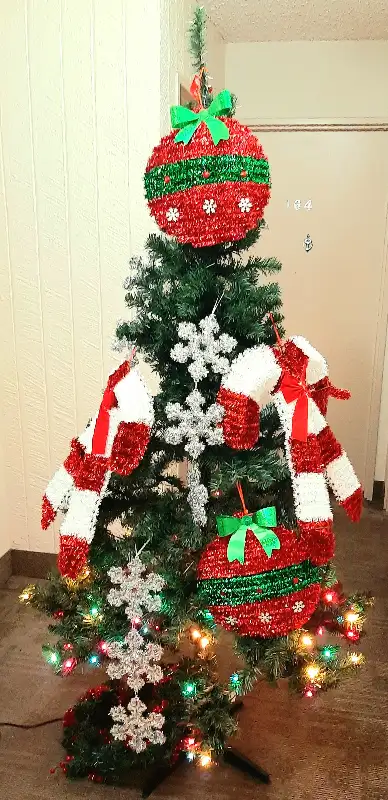 A CHRISTMAS TREE. 6.5 feet, View more