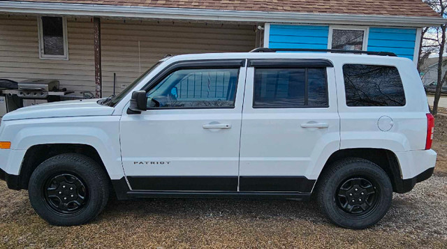 For sale 2014 Jeep patriot 4x4 North Edition in Cars & Trucks in Regina