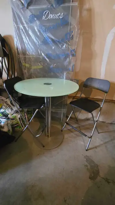 cocktail table and 2 chairs, View more