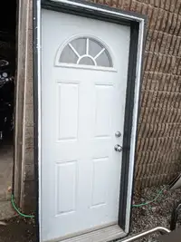 34x80 steel door in frame with hardware and key