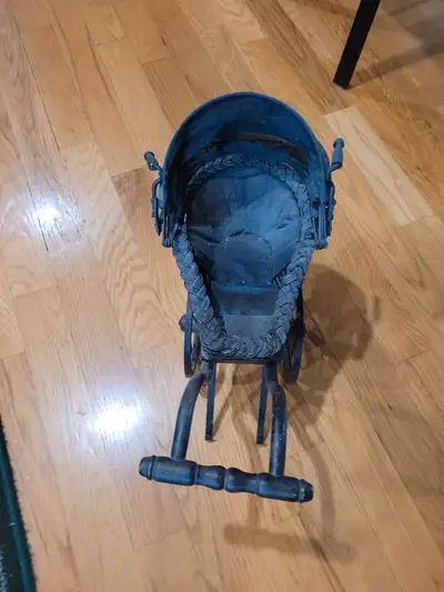 This antique stroller is a unique find, showcasing a charming vintage design. Please note that this...