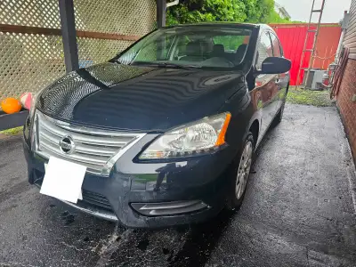 Good little car! 2015 Nissan Sentra. Great on fuel. Comes with 4 winter tires on rims as well. 12400...