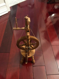 Vintage hand made wooden miniature spinning wheel.15”