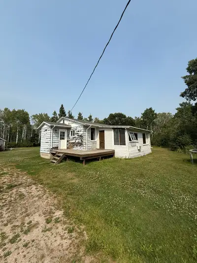 42’x24’ House For Sale To Be Moved At Buyer’s Expense Located east of McCreary, MB Porch addition- 1...