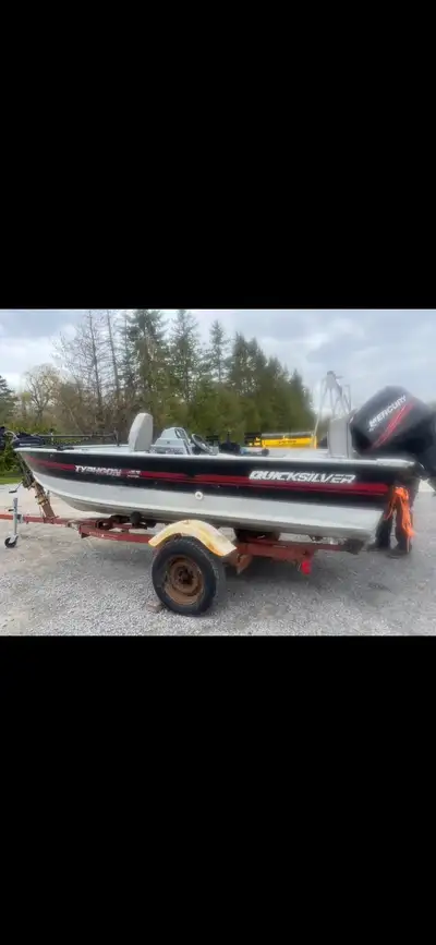 This aluminum Quicksilver Typhoon fishing boat is ready for your next adventure on the water, featur...