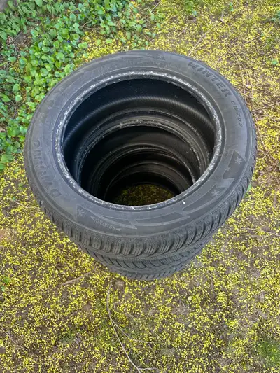 Four used winter tires with half thread on. 215/55/R17. Selling all four for $100 OBO. Txt me on 437...