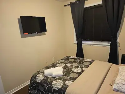 Awesome furnished one bedroom with TV, FREE internet and shared bathroom located in a family friendl...