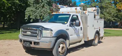 2005 F550 Diesel 6L with Crane and Air Compressor 5 speed Engine and Drive Gear runs good $15,000 AS...