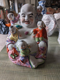 Bouddha rieur aux enfants 