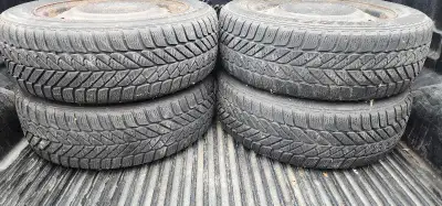 Set of Ultra Grip snow tires on 16 inch rims that came off a Ford Fusion. I have them in storage in...