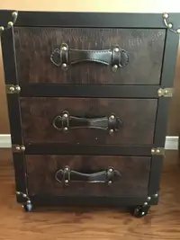  three drawer storage cabinet brown with black accents brass