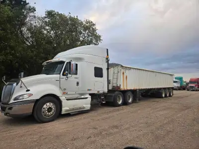 2012 Prostar (deleted) and 94 loadking tridem grain trailer. Spring ride. 475 maxforce 13 spd automa...