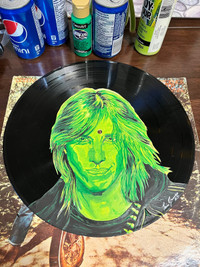 Hand painted rock stars on records