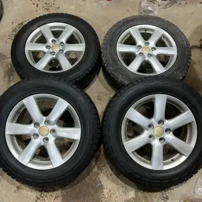 Set of four Toyota RAV4 aluminum alloy rims with 225/65R17 Hankook iPike snow tires. Tires have 80%-...