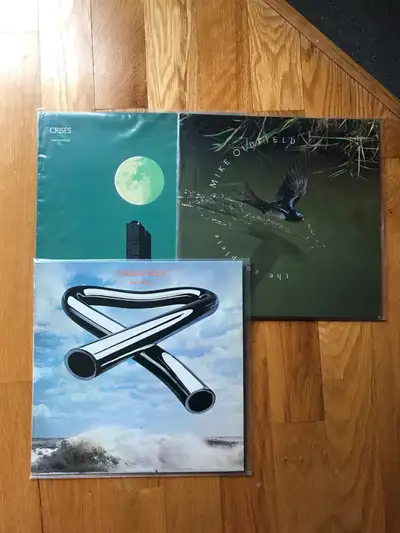 Price Dropped!!!Selling 3 Mike Oldfield lps ( 4 lps ) Tubular Bells, Crises and the complete Mike Ol...