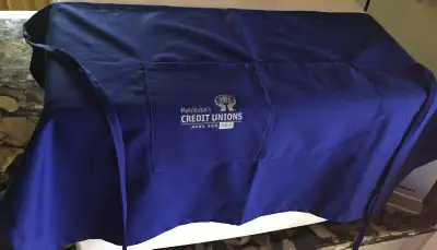 Brand new never used utility apron from Manitoba's Credit Unions, View more