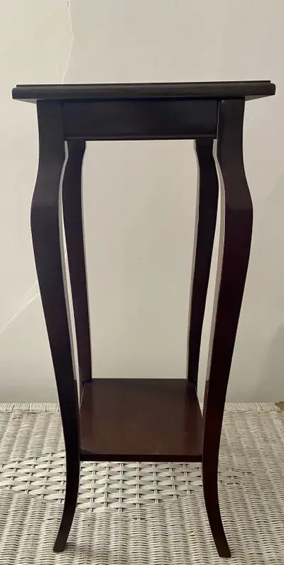 Display tall solid wood stand. Solid wood. In excellent condition. Firm price.