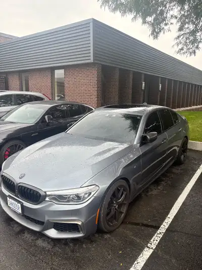 132,958km on this 2019 m550i xdrive. Bluestone metallic with orange interior. Very well maintained....