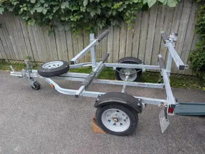 Kayak-ity-Yak brand boat trailer. Can carry 4 kayaks or similar. Includes spare tire, holder, foldin...