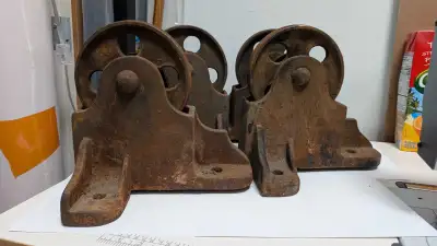 Solid cast iron casters from an industrial factory cart. Excellent condition, no cracks or signs of...