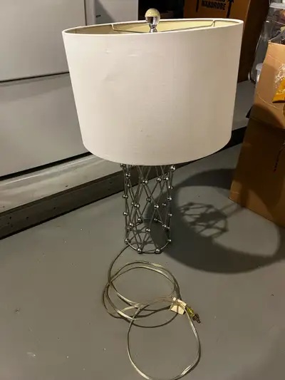 Lamp - silver accent with beige shade, View more