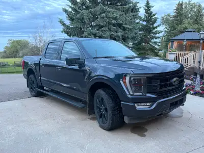 2022 Ford F150 Platinum PowerBoost for sale. Dark blue with the Black Appearance Package. Fully load...