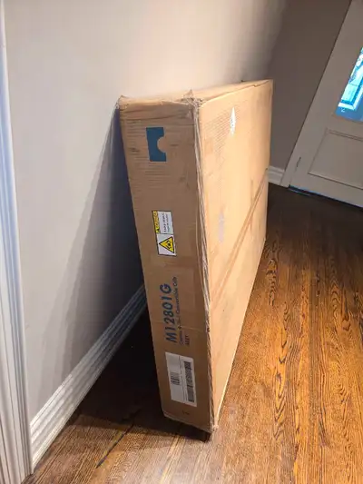 BRAND NEW 4 IN 1 CONVERTIBLE CRIB. STILL IN BOX.COLOR GREY. Price Non negotiable.