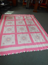 Queen quilt with pink star