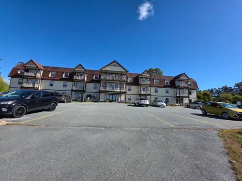 This beautiful apartment is designed for senior Living with everything on 1 Level The second bedroom...