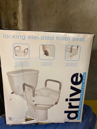 Toilet seat locking elevated