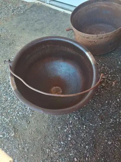 Cast-iron cauldron pots., View more