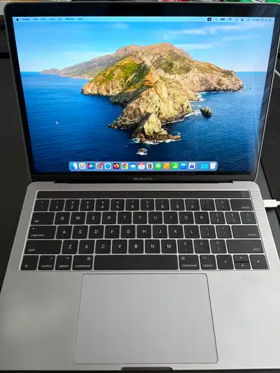 Selling my MacBook Pro 13-inch (2017) with Touch Bar. The laptop is in good condition and works very...