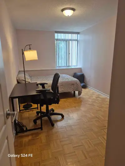 Secure building. Furnished room includes: microwave, shared bathroom, WiFi, balcony, and Gym. Sharin...