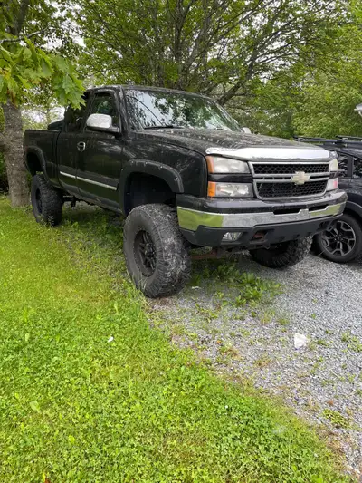 2 Chevy Silverado trucks for sale. Or trade for or towards a boat. First truck was my baby for years...