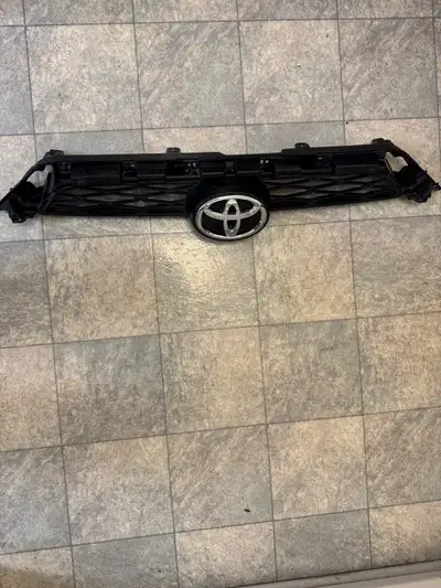 I am selling a used Toyota grill. This grill is designed to fit seamlessly onto your vehicle, enhanc...