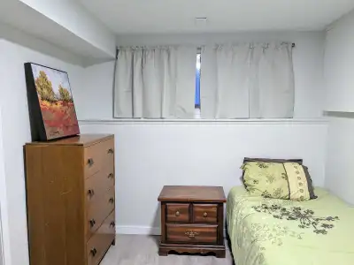 Live in a quiet house, with nice roommates and a small friendly dog. *1 room's available in a bi-lev...