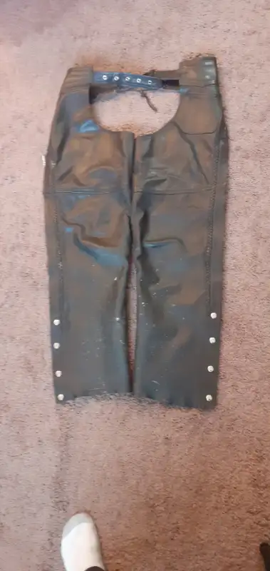 Real Leather Motorcycle Chaps. Size Medium and Adjustable. Color Black. Paid $140