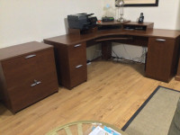 Desk, “L” shaped corner, including 2 drawer filing cabinet. 