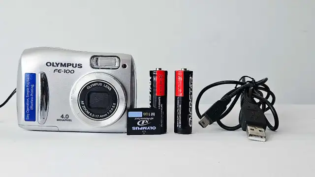 Olympus FE-100  4.0 MP  Compact Digital Camara557472365696798722
