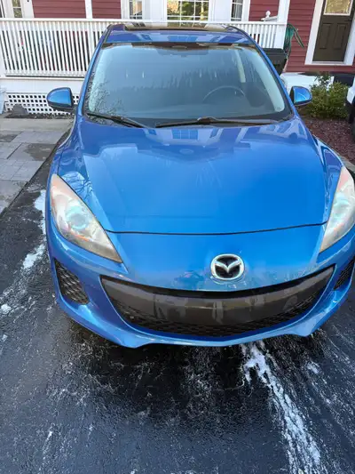 2013 Mazda 3 in great running condition. $3900 as is.