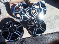 Set of 4  16 x 7 inch FAST rims with 20 lock lug nuts like new