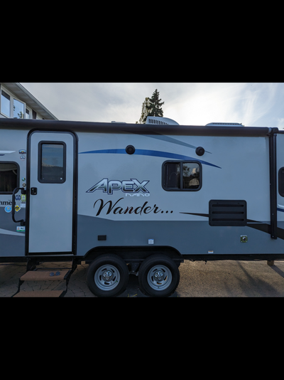 A wonderful couples trailer. 25 foot lightweight travel trailer featuring a rear dinette, sofa slide...