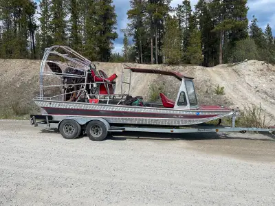 Runs great. Great boat for travel on ice, water, swamp, shallow river. Full canopy keeps passengers...