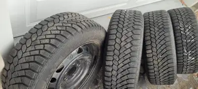Set of four low mileage winter tires, rims and sensors. Size 205/60R16 from a 2019 Mazda3 that had v...