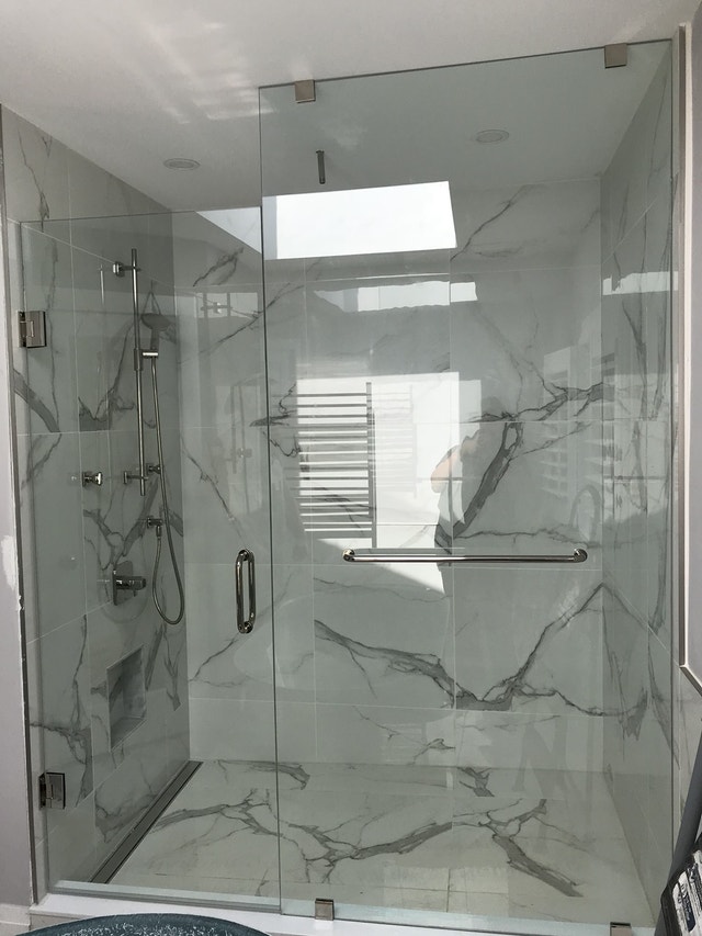 FRAMELESS SHOWER GLASS DOORS BATHTUB ENCLOSURES OFFICE ENTRANCES