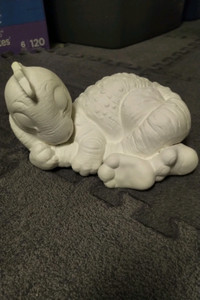 Unfired sleeping baby dino piggy bank 