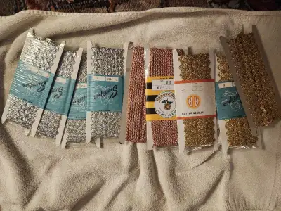 9 pkgs of Gold and Silver Ric Rac and Red/Gol cord , View more